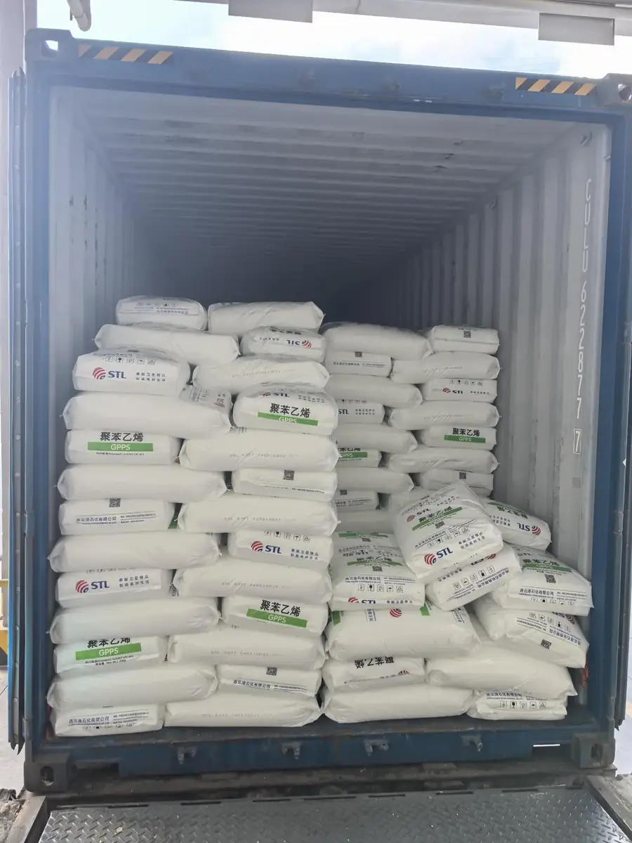 25 kg bags of polystyrene resin stacked inside a shipping container during loading