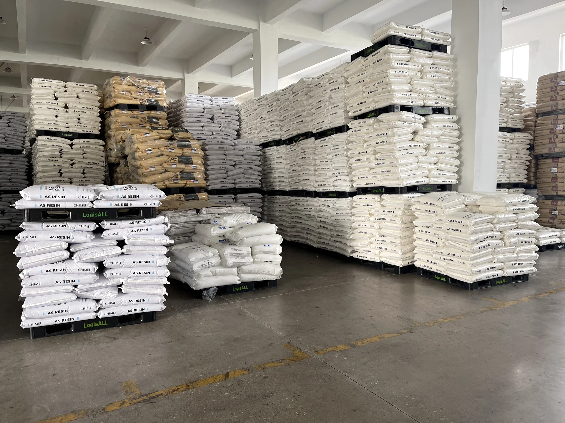 Palletized resin bags in the Fulltrust warehouse
